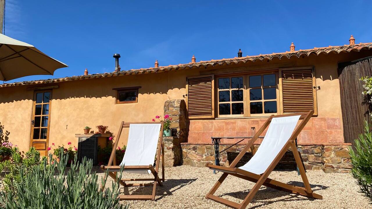 Quinta Tranquila exterior with deck chairs